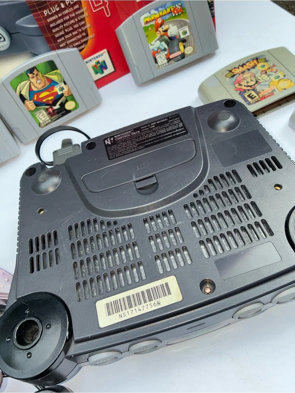 Nintendo 64 Console with Translucent Clear Controllers and Gray Console